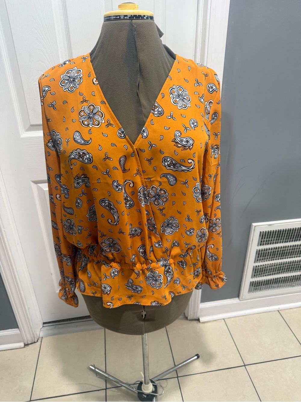 Paisley Print Orange V-Neck Peplum Blouse